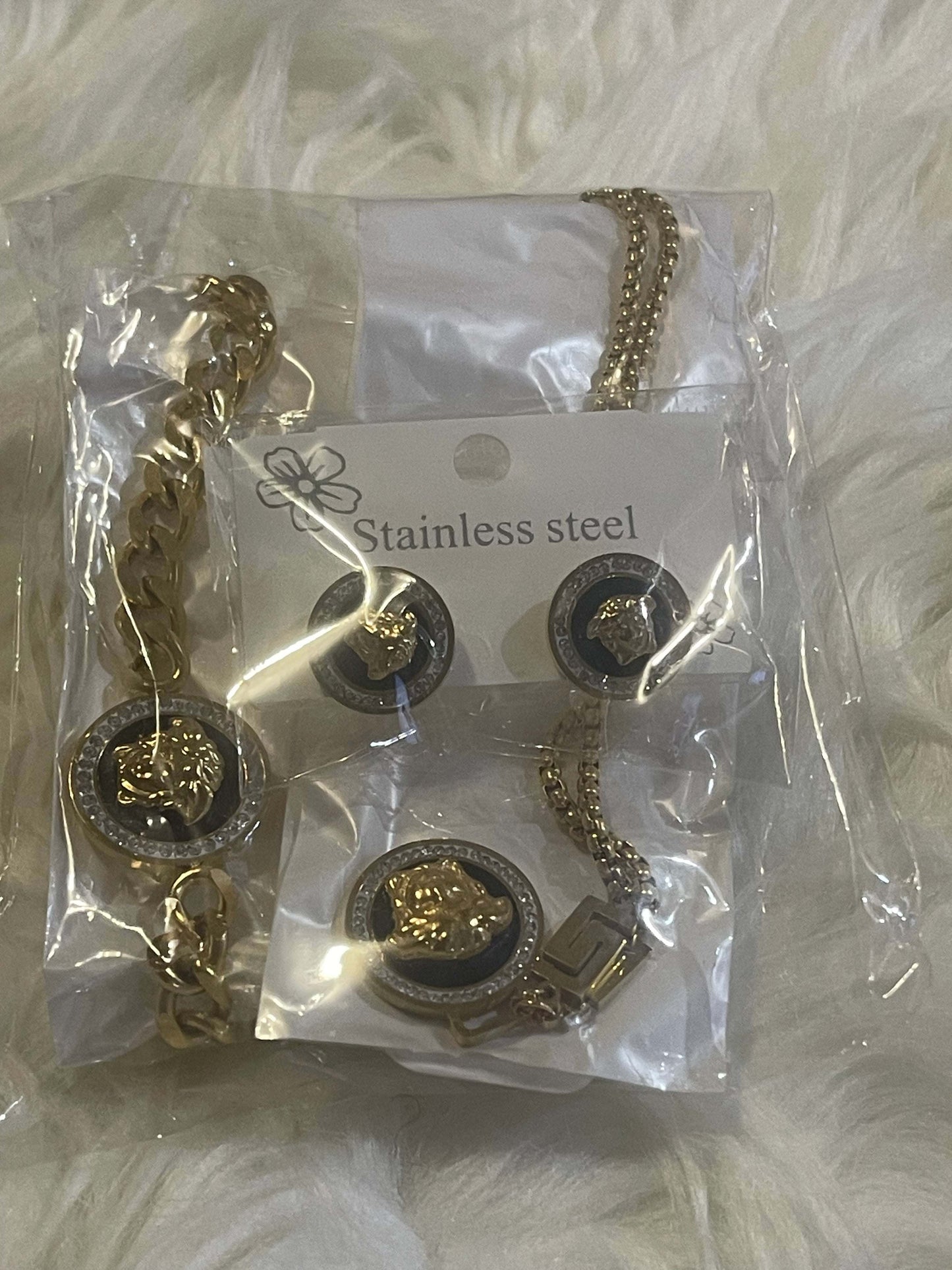 Bentix Brazilian Gold jewelry set featuring gold and silver plated necklaces, bangles, rings, and earrings with elegant Brazilian craftsmanship